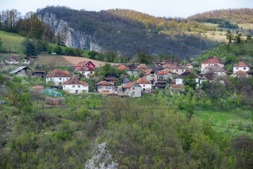 Fototapeta na wymiar Ljubovija, Serbia April 20, 2019: Serbian households on the mountain. Village houses.