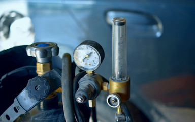 Devices to measure of pressure on thebackground of the car, fragment