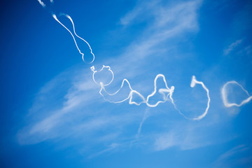Airplane smoke on a sky