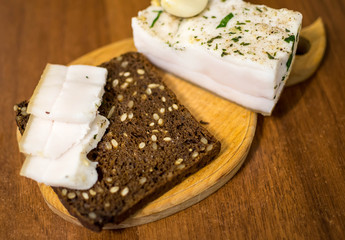 on a piece of black bread bacon garlic