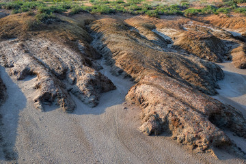 View of soil erosion near saline lake Baskunchak, Russia