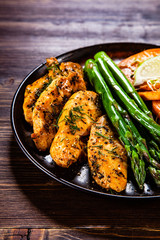 Grilled chicken strips and vegetables