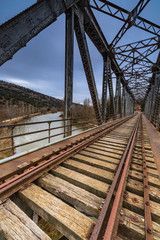 Fototapeta na wymiar iron bridge over the river
