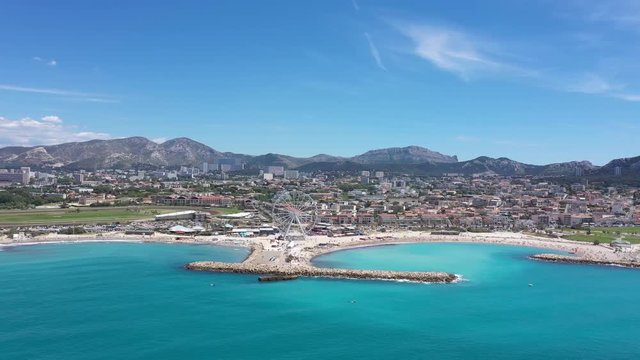 Aerial coastal view beach Prado Borely Marseille France Calanques National Park in background blue water sunny day