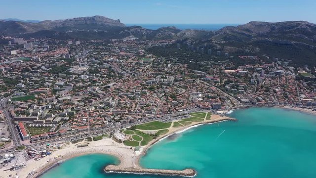 Marseille France aerial back traveling large view beach mediterranean sea Calanques Park sunny day