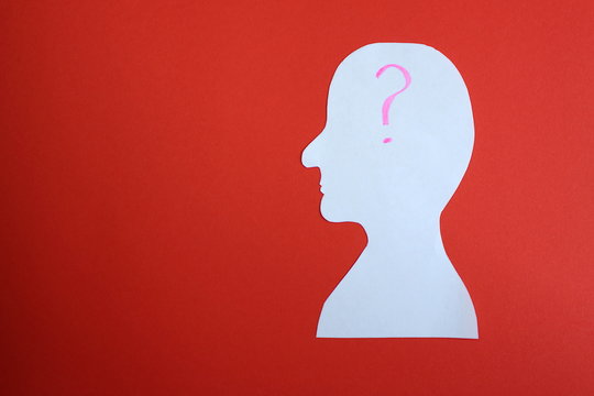 image of a man man cut out of paper cartoon with question mark