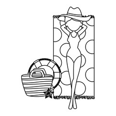 beautiful woman with swimsuit and bag relaxing in towel