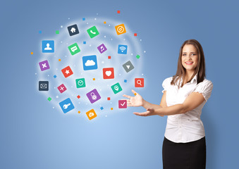 Young person presenting new application icons and symbols
