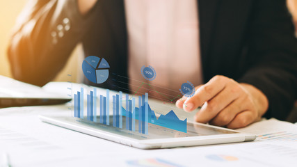 Businessman investment consultant analyzing company financial report balance statement working with...