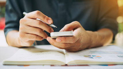 businessman working on project for analyzing company financial report balance statement with...
