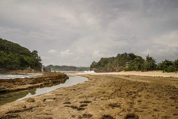 Beautiful landscape of Batu Bengkung Beach in Malang, East Java, Indonesia. Scenic view of beach
