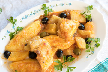 Cod with tomatoes and polenta