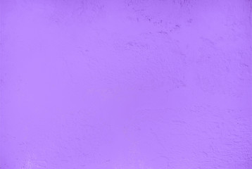 Textured relief plastered painted wall purple colour