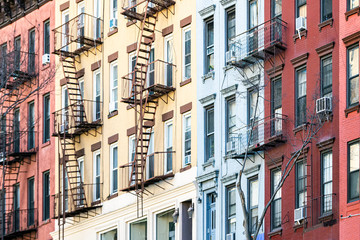 Block of colorful old apartment buildings in the Alphabet City neighborhood of Manhattan in New...