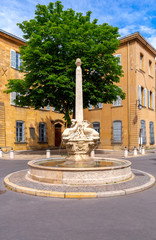 Aix-en-Provence. The square and the fountain of four dolphins on a sunny day.