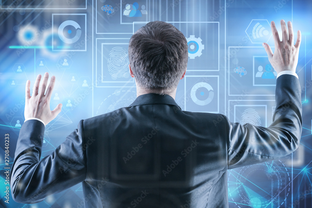 Poster rear view of man using digital interface