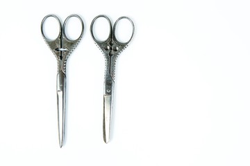 Two vintage scissors with ornament on handle