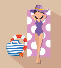 woman taking sun wearing hat with float and purse