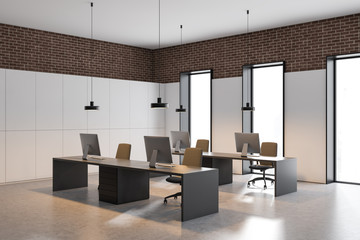 White and brick open space office corner
