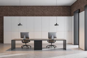 White and brick office workplace
