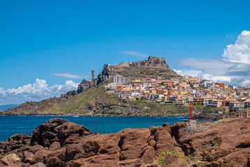 Fototapeta na wymiar Harbor of Castelsardo, a gorgeous medieval village on a promontory in the gulf of Asinara dominated by a castle, Province of Sassari, Sardinia, Italy