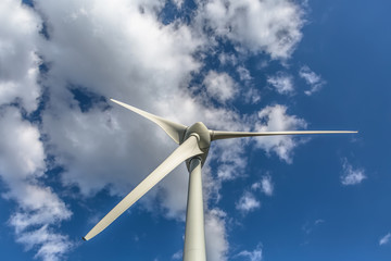 Detailed close up view of a wind turbine; generator, rotor and blade