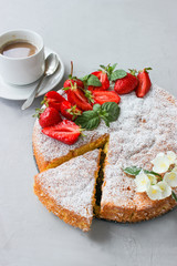 Orange cake decorated with strawberries