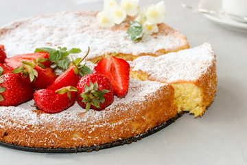 Orange cake decorated with strawberries