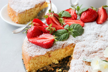 Orange cake decorated with strawberries