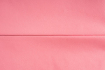 Fototapeta premium Pink coral wrapping paper background with crease texture. Geometry abstract art concept backdrop.