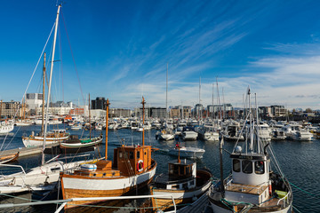 View of the marina and sailing boats. Yacht port located in the port of Bodo. Nordland. Norway.