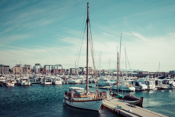 View of the marina and sailing boats. Yacht port located in the port of Bodo. Nordland. Norway.