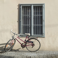 Fototapeta na wymiar A bike with a window in europe.