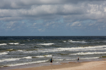 Fototapeta na wymiar Baltic Sea beach with cloudy sky in Palanga Resort