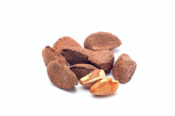 Group of brazil nuts in a shell isolated on white background