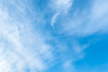 Cloudy and blue sky .