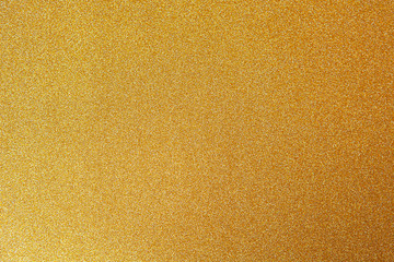 Gold festive backgrond, close-up. Copy space for text. Horizontal. Celebration, holidays, sales, fashion concept, harvesting for mock up.