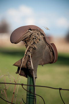 Old boot on a fence post