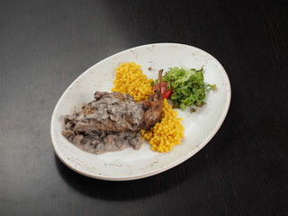 Chicken legs roasted with the mushrooms and lentils