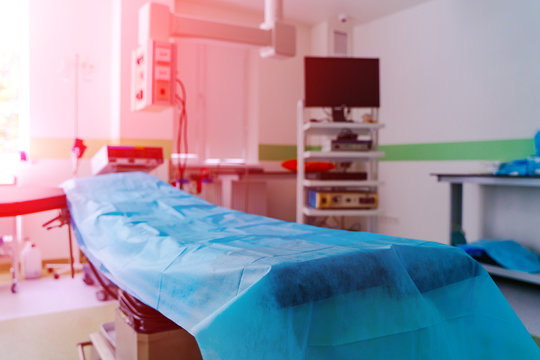 equipment and medical devices in modern operating room take with art lighting and blue filter