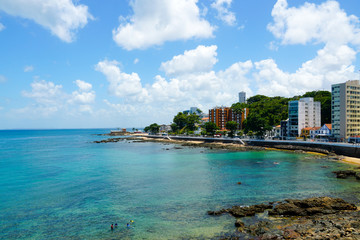 Coastline city of Salvador Bahia, Brazil. Boardwalk coast next the Barra lighthouse and Santa Maria Fort.