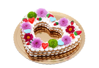 Valentine cake with the word love and flowers.