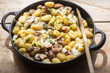 Gnocchi with mushrooms, blue cheese & parsley
