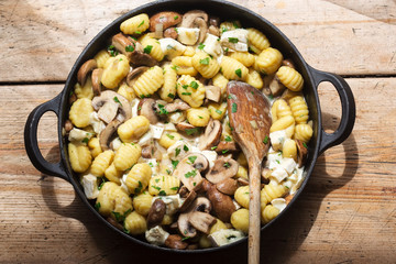 Gnocchi with mushrooms, blue cheese & parsley