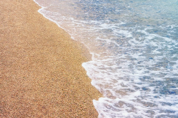Sandy beach on a calm day. Montenegro, Adriatic Sea, Kotor Bay