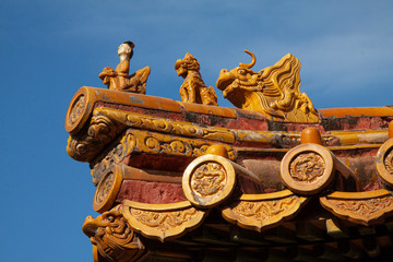 Chinese imperial roof decoration or roof charms, or roof figures with emperor and creatures in the...