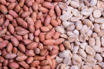 raw and roasted peanuts scattered on a wooden table. Peanut Bean Closeup