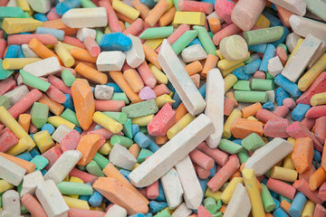 Crayons for drawing. Box with crayons for children. Get ready to paint on asphalt. Holiday with chalk. Calcium is good for teeth.