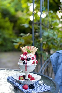 softijs with berries and cream. ice-cream with fruits in a cube