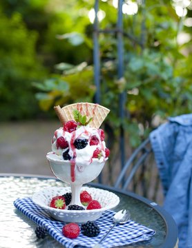 softijs with berries and cream. ice-cream with fruits in a cube